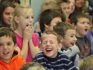 students laugh with social studies show